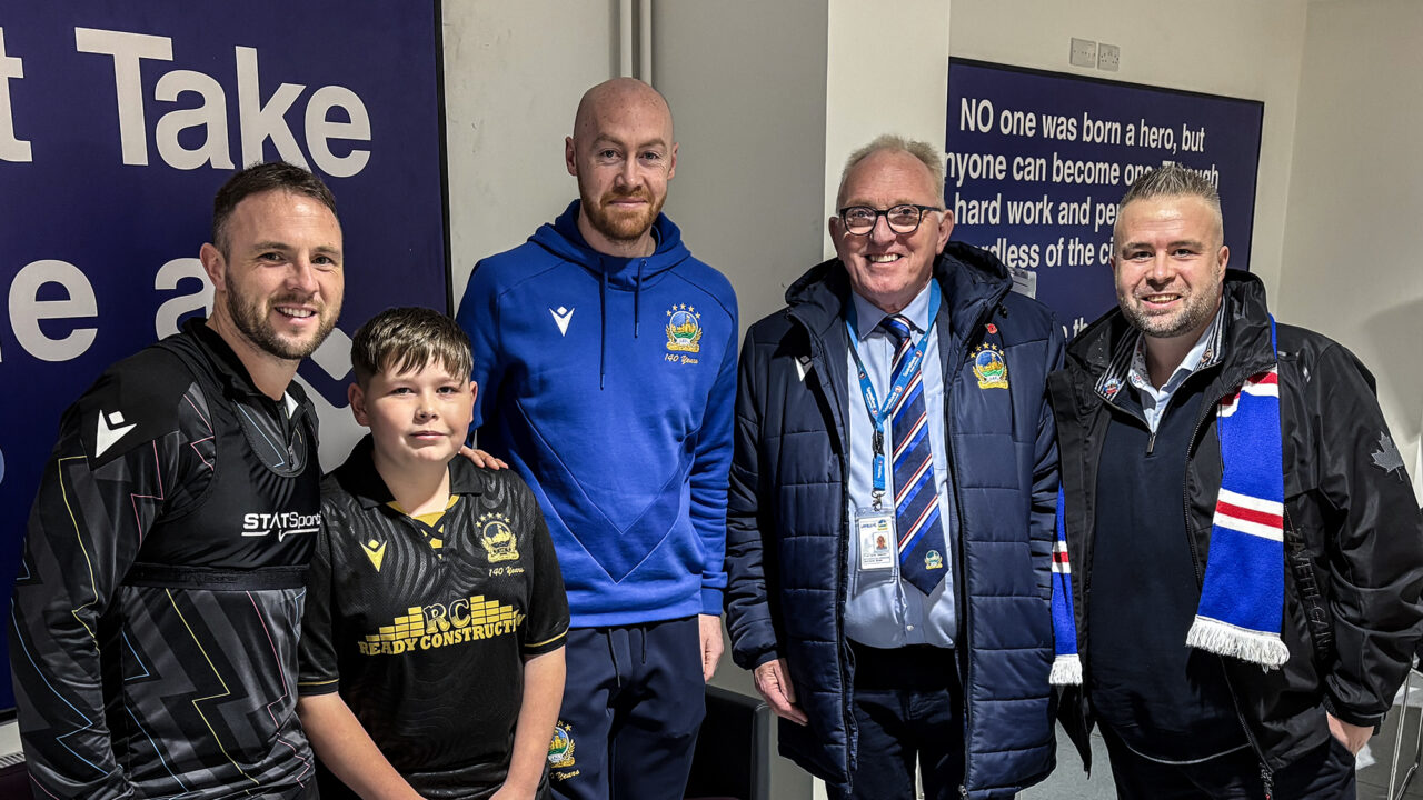 Linfield Welcome Supporter Joshua Moore as Special Guest at Windsor Park